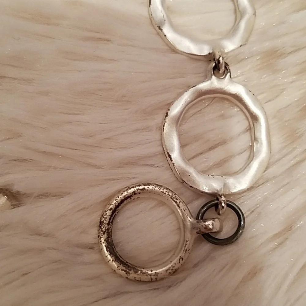 Kenneth Cole silvertone circle toggle bracelet